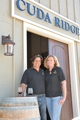 Larry and Margie Dino outside their Cude Ridge winery on Arroyo Road.  (Photo courtesy of Cuda Ridge Wines)