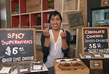Monica Martinez serves up superworms and salted crickets at San Francisco's Ferry Building.