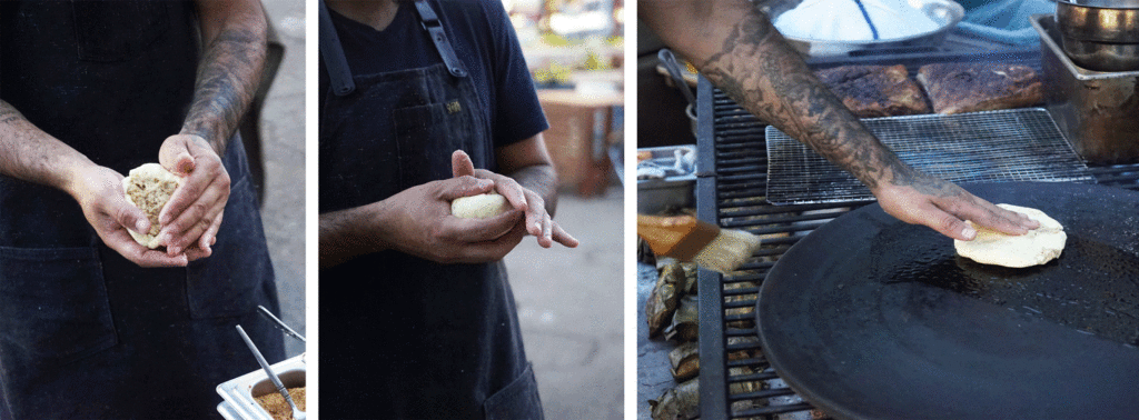 At Classic Cars West, Popoca’s current outdoor pop-up space, Anthony Salguero forms masa for the pupusa, fills it, and then shapes the stuffed pupusa before placing it on the comal, which is positioned on a wood-fired grill. 
